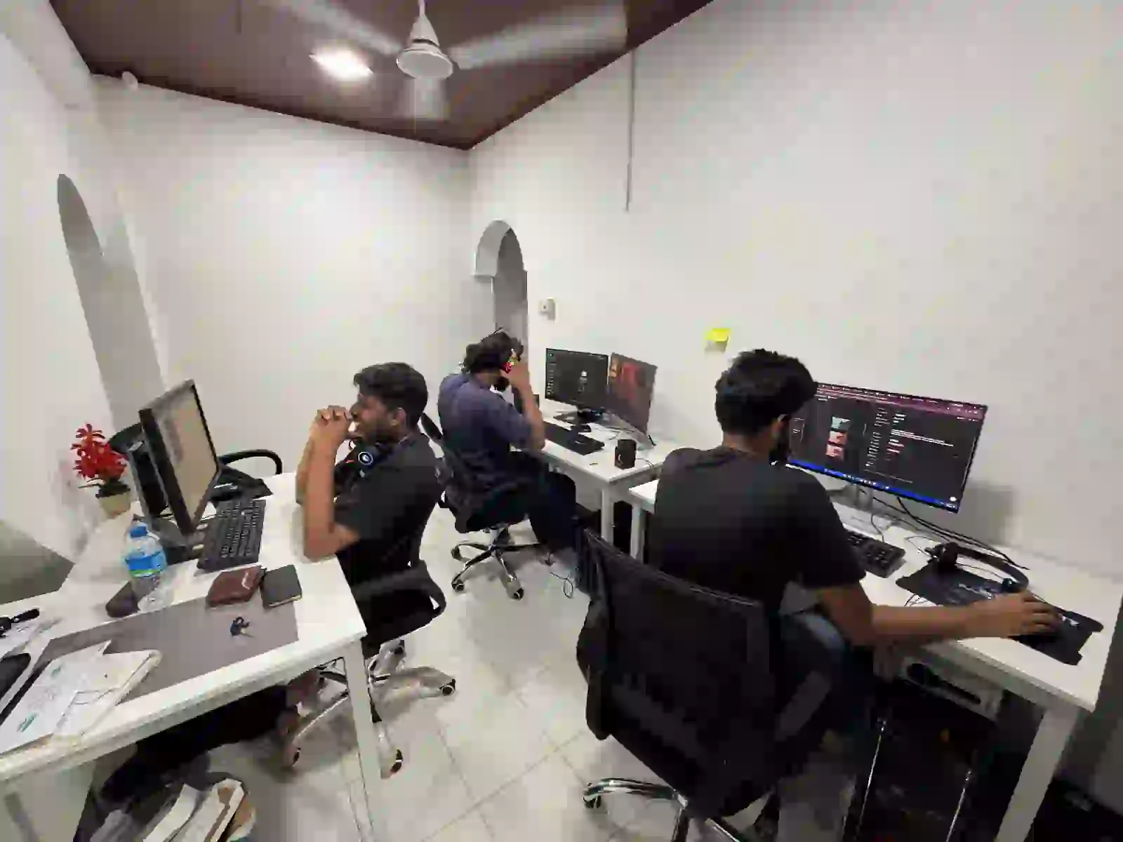 Sky Designers team working at their office desks